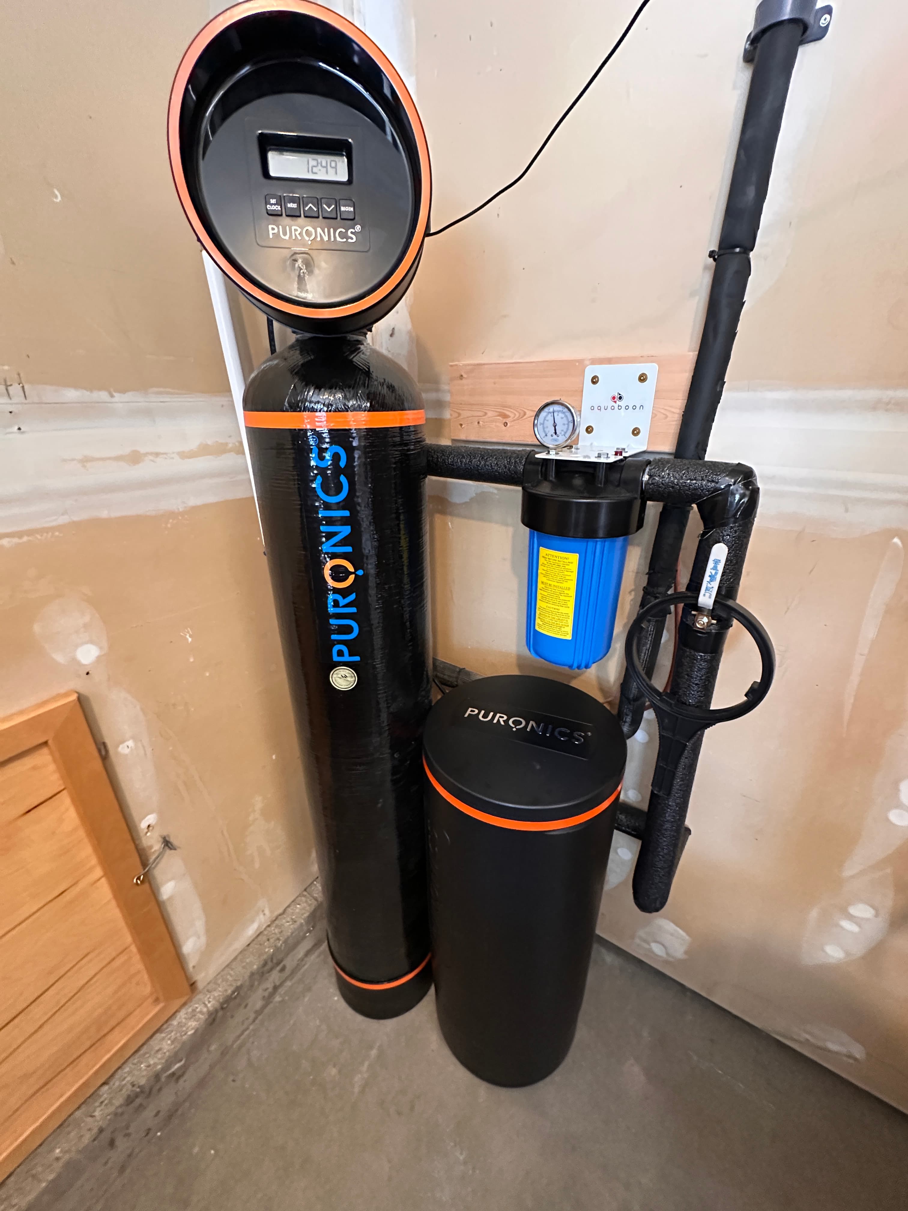 Whole-home filter stack in a Phoenix garage